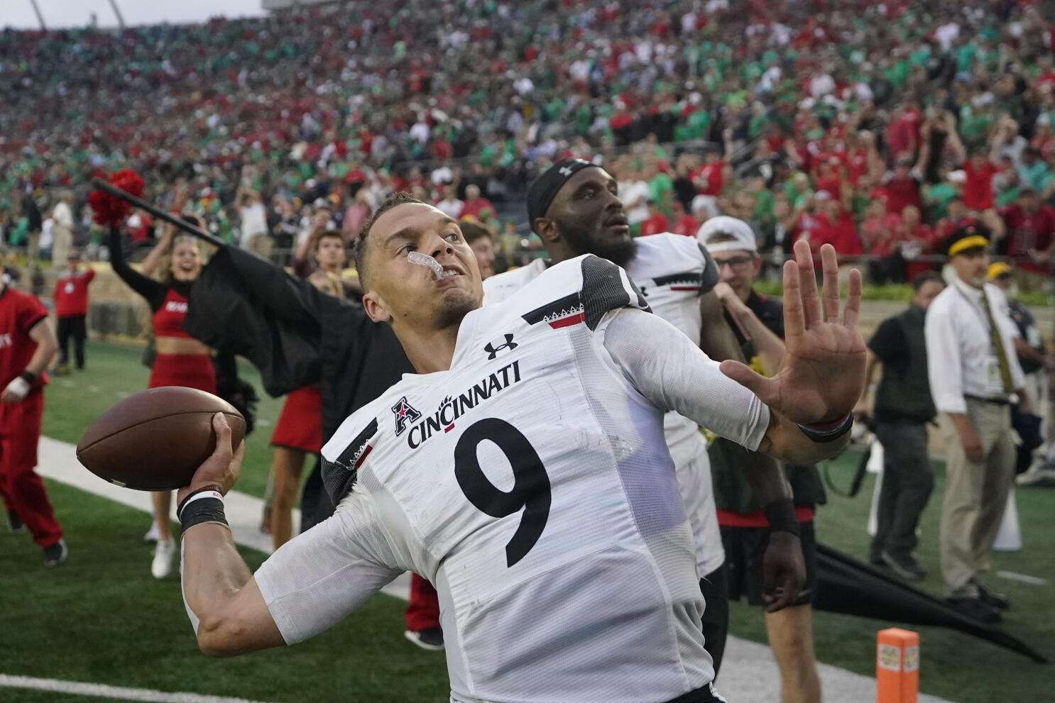 Ridder helps Bearcats rally for 38-24 win at Indiana