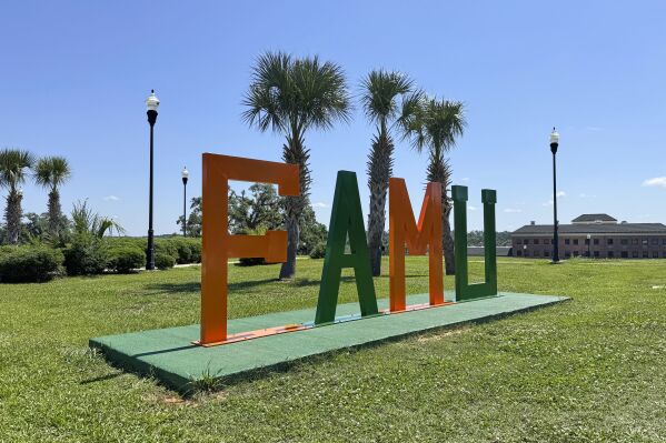 A sign decorates the campus of Florida AM University in Tallahassee, Fla., Wednesday, May 14, 2025. (AP Photo/Kate Payne)