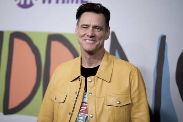 CORRECTS TITLE TO MEMOIRS AND MISINFORMATION - FILE - In this Sept. 5, 2018 file photo, Jim Carrey attends the LA Premiere of "Kidding "at ArcLight Hollywood in Los Angeles. Carrey is working on a novel called "Memoirs and Misinformation," Alfred A. Knopf announced Wednesday, Oct. 2, 2019. Along with co-author Dana Vacjon, Carrey will take on celebrity, acting, romance and some other subjects he's familiar with. (Photo by Richard Shotwell/Invision/AP, File)