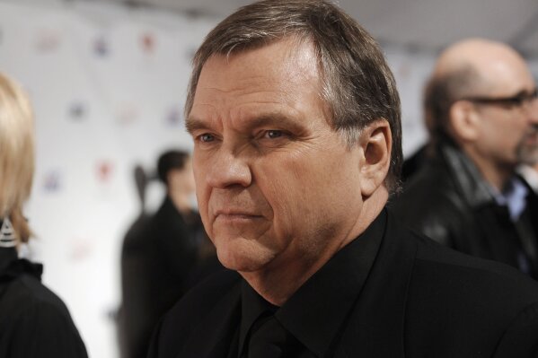 FILE - In this Feb. 6, 2009, file photo, singer Michael Lee Aday, who goes by the stage name Meat Loaf, arrives at the MusiCares Person of the Year tribute honoring Neil Diamond in Los Angeles. Meat Loaf has filed a lawsuit against a hotel at Dallas-Fort Worth International Airport and organizers of a horror convention held there, blaming them for negligence when he fell from a stage while answering questions from convention goers last May. He and his wife Deborah Lee Gillespie Aday filed the suit Monday, Jan. 13, 2020, in a state district court in Fort Worth, Texas, against the Hyatt Corp. and Texas Frightmare Weekend LLC. (AP Photo/Chris Pizzello, File)