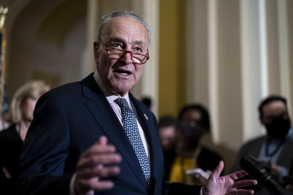 Senate Majority Leader Chuck Schumer, D-N.Y., speaks to reporters as the Senate works to pass a stopgap spending bill that would fund the federal government into mid-December, at the Capitol in Washington, Wednesday, Sept. 28, 2022. (AP Photo/J. Scott Applewhite)
