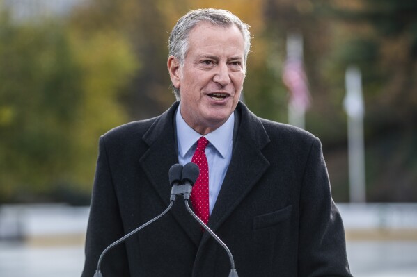New York City Mayor Bill de Blasio speaks at the opening of New York's Wollman Rink in Central Park, Nov. 14, 2021. (AP Photo/Brittainy Newman, File)