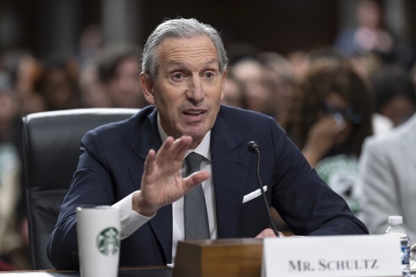 FILE - Starbucks founder and former CEO Howard Schultz testifies before the Senate Health, Education, Labor and Pensions Committee in Washington on March 29, 2023. Schultz is stepping down from the company's board of directors, the coffee chain announced. Schultz is credited for transforming the Seattle-based business into the coffee giant it's known as today. His departure from the board is “part of a planned transition,” the company said Wednesday Sept. 13 2023. (AP Photo/J. Scott Applewhite, File)