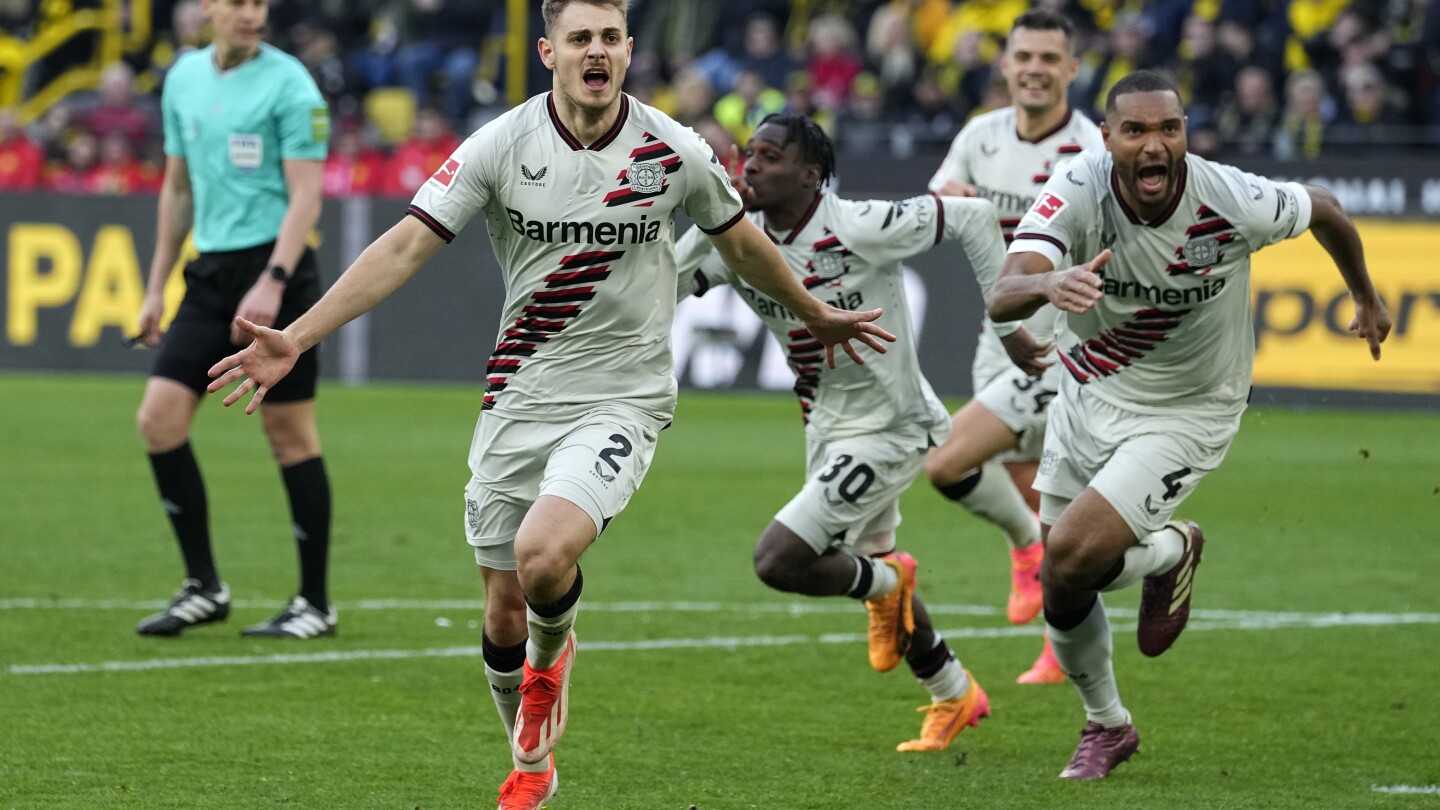 Stanišić punktet spät in Dortmund und hält Leverkusens Rekord von 45 ungeschlagenen Spielen aufrecht
