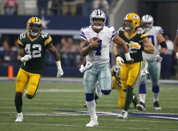 Green Bay Packers beat Dallas Cowboys on final play in NFL playoff thriller, NFL