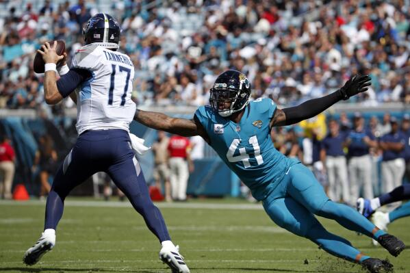 Tennessee Titans outside linebacker Harold Landry (58) follows a play  during the second half of an NFL football game against the Jacksonville  Jaguars, Sunday, Oct. 10, 2021, in Jacksonville, Fla. (AP Photo/Phelan
