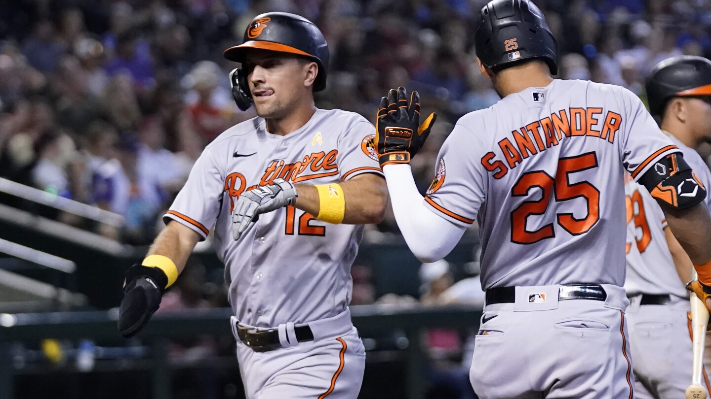 Baltimore Orioles' Cedric Mullins pauses at first base after hitting a  single against the Arizona Diamondbacks during the ninth inning of a  baseball game Friday, Sept. 1, 2023, in Phoenix. The Diamondbacks