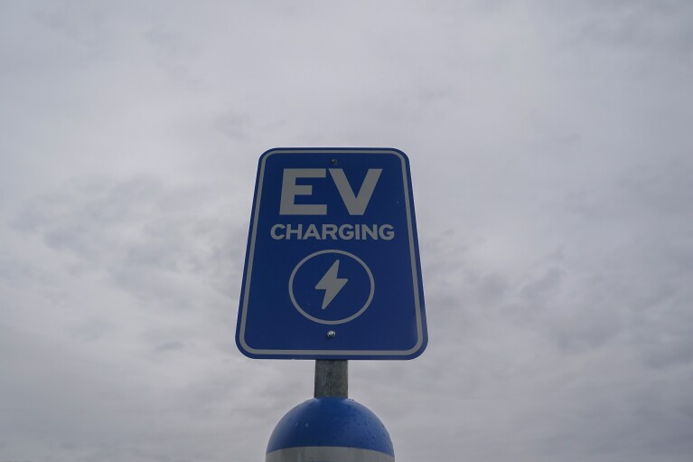 An indication sits at an electrical car charging station, Friday, March 8, 2024, at an electrical lorry charging station in London, Ohio. The charging ports are a crucial part of President Joe Biden's effort to motivate motorists to move far from gasoline-powered vehicles and trucks that add to worldwide warming. (AP Photo/Joshua A. Bickel)