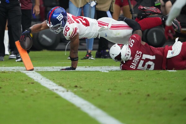 Giants running back Saquon Barkley is questionable for Sunday's