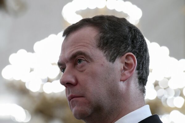 
              FILE - In this Thursday, Dec. 28, 2017 file photo, Russian Prime Minister Dmitry Medvedev attends an award ceremony in the Kremlin, in Moscow, Russia.  The Trump administration has released a list of 114 Russian politicians and 96 "oligarchs" it says are linked to Russian President Vladimir Putin, but it’s decided not to issue any extra sanctions for now. Medvedev was previously Russian president from 2008 through 2012. That was in a “tandem” arrangement with Putin, who left the presidency to become prime minister, and still wielded considerable power while avoiding presidential term limits. (Kirill Kudryavtsev/Pool Photo via AP, File)
            