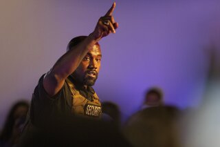 Kanye West makes his first presidential campaign appearance, Sunday, July 19, 2020 in North Charleston, S.C. Rapper Kanye West, in his first event since declaring himself a presidential candidate, delivered a lengthy monologue Sunday touching on topics from abortion and religion to international trade and licensing deals. Whether he's actually seeking the nation's highest office remains a question. (Lauren Petracca Ipetracca/The Post And Courier via AP)