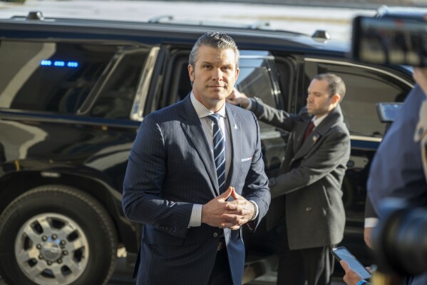 Defense Secretary Pete Hegseth arrives at the Pentagon, Monday, Jan. 27, 2025 in Washington. (AP Photo/Kevin Wolf)
