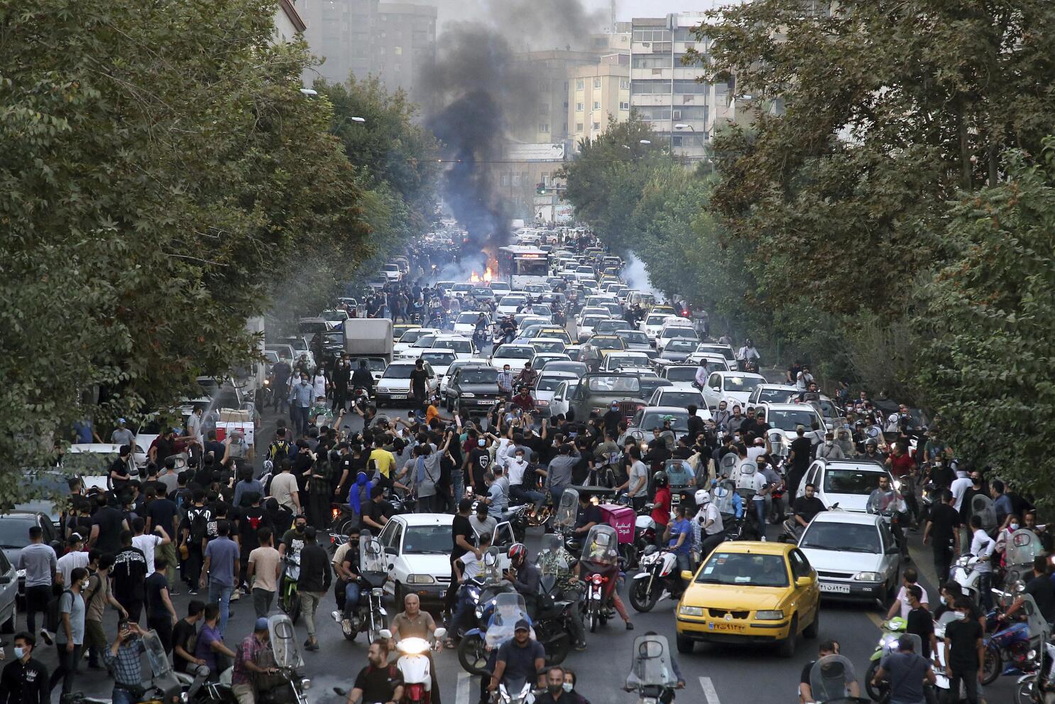 Person with red and black face paint photo – Free Tehran Image on