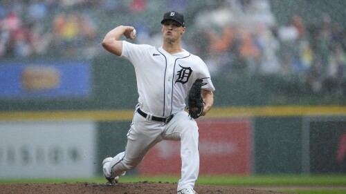 Detroit Tigers pitcher Matt Manning throws in the rain against the Toronto Blue Jays in the first inning of a baseball game, Saturday, July 8, 2023, in Detroit. (AP Photo/Paul Sancya)