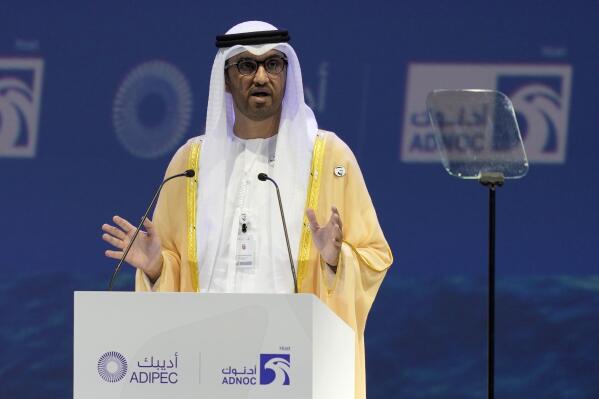 FILE - The Emirati Minister of State and the CEO of Abu Dhabi's state-run Abu Dhabi National Oil Co. Sultan Ahmed al-Jaber talks at the Abu Dhabi International Petroleum Exhibition & Conference in Abu Dhabi, United Arab Emirates, Oct. 31, 2022. (AP Photo/Kamran Jebreili, File)