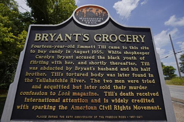 A Mississippi Freedom Trail marker sits before the remains of Bryant's Grocery and Meat Market in Money, Miss., July 14, 2021, where in 1955, Emmett Till, a 14-year-old African American teen, was accused of whistling at a white woman, at the family's store. Till was later kidnapped, beaten and killed. For more than a century, one of Mississippi’s largest and most elaborate Confederate monuments has looked out over the lawn at the courthouse in the center of Greenwood. It's a Black-majority city with a rich civil rights history. Officials voted last year to remove the statue, but little progress has been made to that end. (AP Photo/Rogelio V. Solis)