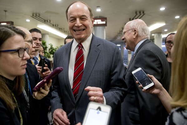
              Sen. Patrick Leahy, D-Vt., right, and Sen. Richard Shelby, R-Ala., center, share a laugh as they speak to reporters the morning after House and Senate negotiators worked out a border security compromise hoping to avoid another government shutdown on Capitol Hill, Tuesday, Feb. 12, 2019, in Washington. (AP Photo/Andrew Harnik)
            