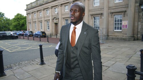 Manchester City soccer player Benjamin Mendy arrives at Chester Crown Court, where he is appearing accused of rape and attempted rape, in Chester, England, Monday June 26, 2023. Jurors failed to reach verdicts on those two counts at his first trial where he was found not guilty of seven other sex offences against four women. (Peter Byrne/PA via AP)