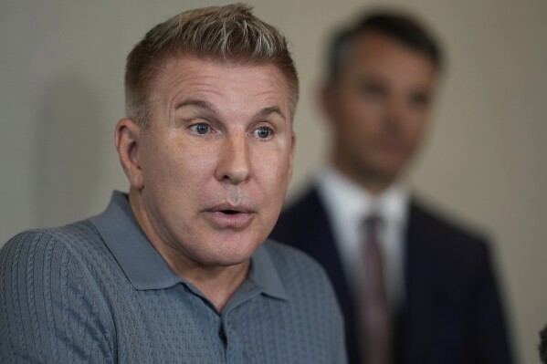 Pardoned by Trump, reality TV star Todd Chrisley says prison has changed  him | AP News