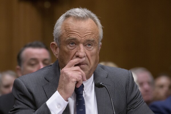 RFK Jr. on defense over vaccine views in heated confirmation hearing | AP  News
