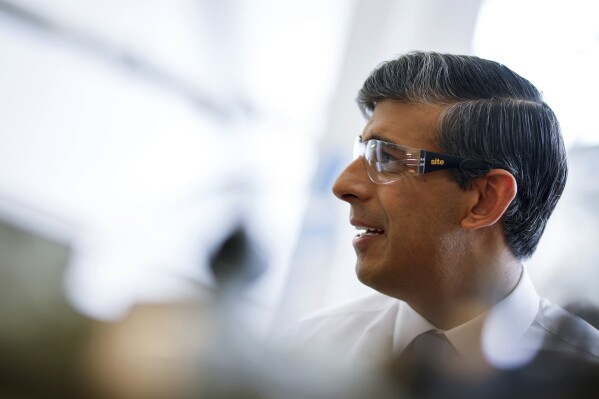 Britain's Prime Minister and Conservative Party leader Rishi Sunak reacts during a visit of University Technical College (UTC) in Silverstone, England, on Tuesday June 11, 2024, in the build-up to the UK general election on July 4. (Benjamin Cremel, Pool Photo via AP)