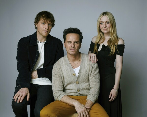 Johnny Flynn, from left, Andrew Scott, and Dakota Fanning pose for a portrait to promote the television miniseries "Ripley" on Tuesday, March 26, 2024, in New York. (Photo by Taylor Jewell/Invision/AP)