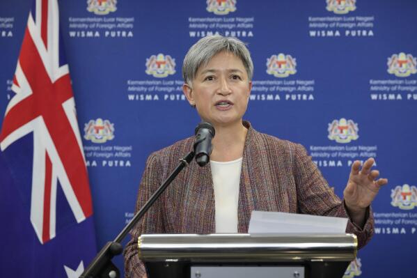 Australian Foreign Minister Penny Wong speaks during a press conference after meeting with Malaysian Foreign Minister Saifuddin Abdullah during visit to Foreign Ministry in Putrajaya, Malaysia, Tuesday, June 28, 2022. (AP Photo/Vincent Thian)