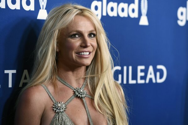 FILE - This April 12, 2018 file photo shows Britney Spears at the 29th annual GLAAD Media Awards in Beverly Hills, Calif. Though Black Out Tuesday was originally organized by the music community, the social media world went dark on Tuesday in support of the Black Lives Matter movement and the many killings of black people around the world that has caused outrage and protests. "I won't be posting on social media and I ask you all to do the same," Britney Spears tweeted. "We should use the time away from our devices to focus on what we can do to make the world a better place …. for ALL of us !!!!!" (Photo by Chris Pizzello/Invision/AP, File)