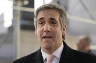 FILE - Donald Trump's former lawyer and fixer Michael Cohen speaks to reporters after a second day of testimony before a grand jury investigating hush money payments he arranged and made on the former president's behalf on March 15, 2023, in New York. Former President Donald Trump did not call Cohen a “cereal liar” in a Truth Social post. An image of the alleged post was fabricated. (AP Photo/Mary Altaffer, File)