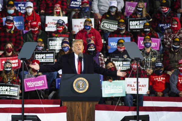President Donald Trump speaks at Duluth International Airport on Wednesday, Sept. 30, 2020, during a campaign stop in Duluth, Minn. (AP Photo/Jack Rendulich)