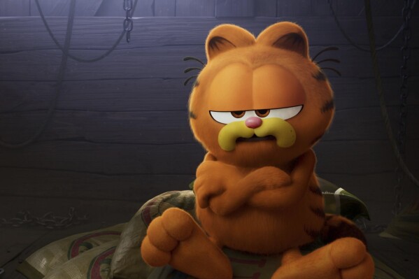 This image released by Sony Pictures shows Garfield, voiced by Chris Pratt, in a scene from the animated film "The Garfield Movie." (Columbia Pictures/Sony via AP)
