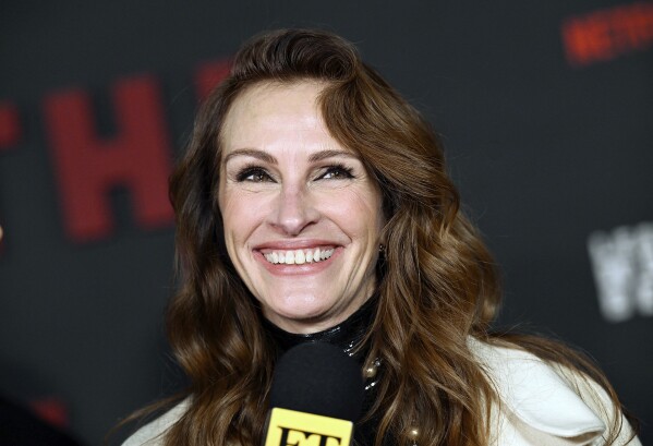 FILE - Julia Roberts attends the premiere of Netflix's "Leave the World Behind," Dec. 4, 2023, in New York. (Photo by Evan Agostini/Invision/AP, File)