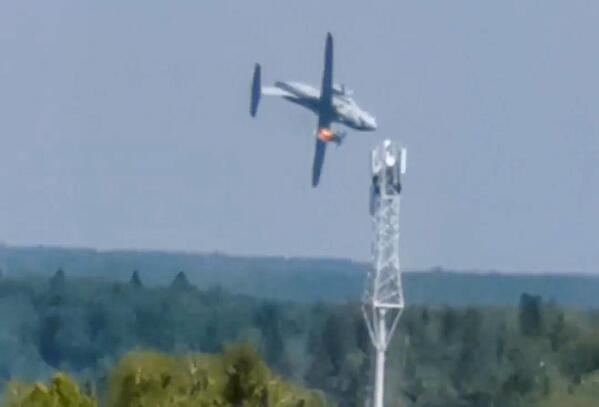 In this handout photo taken from video provided by Dmitry Ovchinnikov, The new light military transport burning plane Il-112V flies down near Kubinka airfield about 45 kilometers (28 miles) west of Moscow, Russia, Tuesday, Aug. 17, 2021. A prototype military transport plane crashed while performing a test flight outside Moscow on Tuesday, Russian news agencies reported, citing Russia's United Aircraft Corporation. The new light military transport plane, Il-112V, crashed in a forested area as it was coming in for a landing at the Kubinka airfield about 45 kilometers (28 miles) west of Moscow, spokespeople of the corporation told the Tass news agency. (Dmitry Ovchinnikov via AP)
