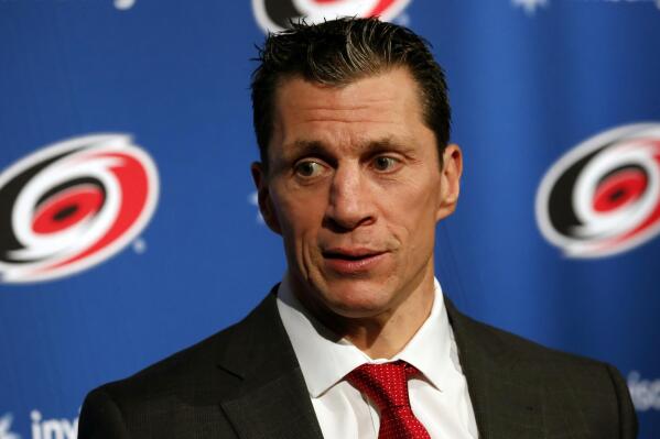 FILE - Carolina Hurricanes head coach Rod Brind 'Amour speaks at a press conference following an NHL hockey game against the Dallas Stars in Raleigh, N.C., in this Saturday, Feb. 16, 2019, file photo. The Carolina Hurricanes have reached a three-year contract extension with coach Rod Brind’Amour after three straight playoff appearances. The Hurricanes announced the agreement Thursday, June 17, 2021, a little more than a week after the Hurricanes were eliminated by reigning Stanley Cup champion Tampa Bay in the second round. (AP Photo/Karl B DeBlaker, File)