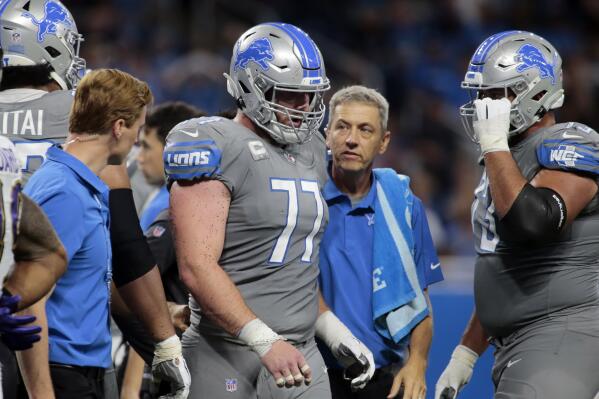 FILE - In this Sunday, Sept. 26, 2021, file photo, Detroit Lions center Frank Ragnow (77) walks to the sidelines after being injured in the second half of an NFL football game against the Baltimore Ravens in Detroit. Ragnow has a season-ending toe injury that requires surgery, a person familiar with the situation told The Associated Press on Tuesday, Oct. 12, 2021. The person spoke on condition of anonymity because the team had not provided an update on Ragnow's condition. (AP Photo/Tony Ding, File)