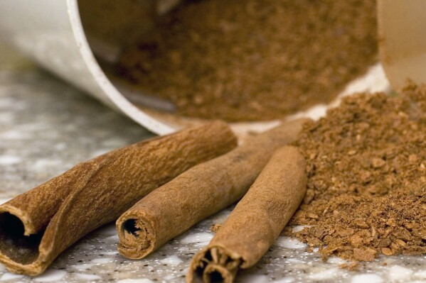 FILE - Stick and ground cinnamon is displayed for a photograph in Concord, N.H., on March 2, 2008. Many foods, including spices, contain lead from natural sources such as soil and water, said Karen Everstine, technical director for FoodchainID, a company that tracks food supply chains. Spices can accumulate lead from other sources in the environment, such as leaded gasoline or other pollution. Some lead in spices may come from manufacturing, storage or shipping processes. (AP Photo/Larry Crowe, File)