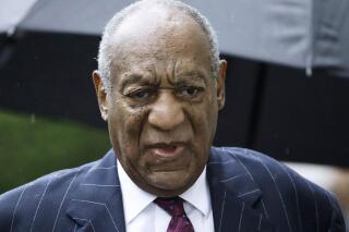 FILE - Bill Cosby arrives for a sentencing hearing following his sexual assault conviction at the Montgomery County Courthouse in Norristown Pa., on Sept. 25, 2018. A lawyer for Cosby asked the U.S. Supreme Court on Monday, Jan. 31, 2022, to reject a bid by prosecutors to revive his criminal sex assault case.  The 84-year-old actor and comedian has been free since June 2021, when a Pennsylvania appeals court overturned his conviction and released him from prison after nearly three years.  (AP Photo/Matt Rourke, File)