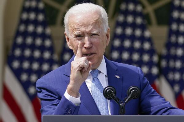 FILE - In this April 8, 2021, file photo President Joe Biden gestures as he speaks about gun violence prevention in the Rose Garden at the White House in Washington. Biden will mark his 100th day in office on Thursday, April 29. (AP Photo/Andrew Harnik, File)