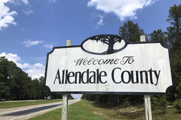 FILE - This June 20, 2019, photo, shows a welcome sign for Allendale County, South Carolina's smallest county. (AP Photo/Jeffrey Collins, file)