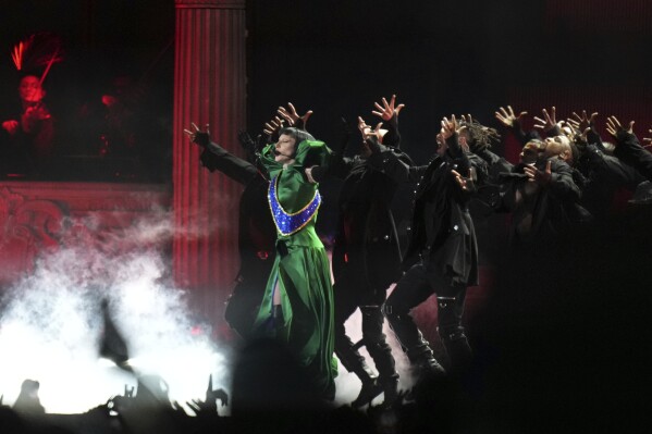 Lady Gaga performs during her free concert on Copacabana Beach in Rio de Janeiro, Saturday, May 3, 2025. (AP Photo/Silvia Izquierdo)