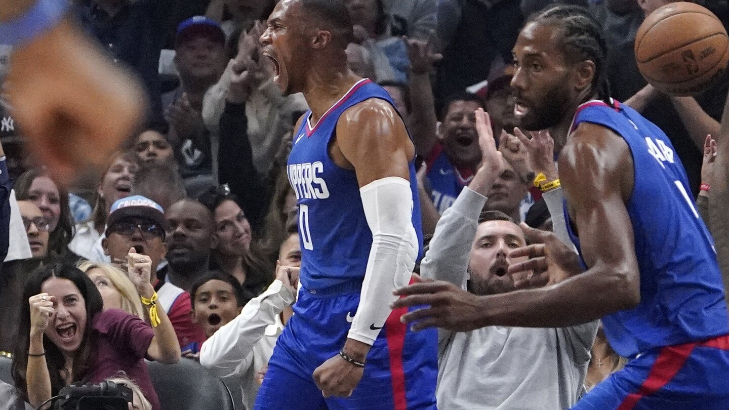 Leonard and George dominate in Clippers’ 123-111 win over the Trail Blazers to open the season