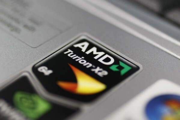 FILE - An Advance Micro Devices (AMD) logo is shown on a computer at Best Buy in Mountain View, Calif., Oct. 14, 2009. (AP Photo/Paul Sakuma, File)