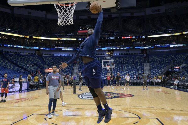 New Orleans Pelicans forward Zion Williamson practices before an NBA basketball game between the New Orleans Pelicans and the Los Angeles Clippers in New Orleans, Saturday, Jan. 18, 2020. Williamson is expected to return to play Wednesday against the San Antonio Spurs. (AP Photo/Matthew Hinton)