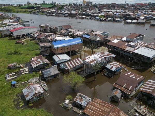 An aerial view of the Belen neighborhood of Iquitos, Peru, Saturday, May 25, 2024. (AP Photo/Rodrigo Abd)
