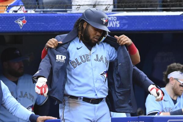 July 1, 2022, Toronto, ON, Canada: Toronto Blue Jays' Lourdes Gurriel Jr  has the home run jacket put on him by Vladimir Guerrero Jr after hitting a  solo home run in off