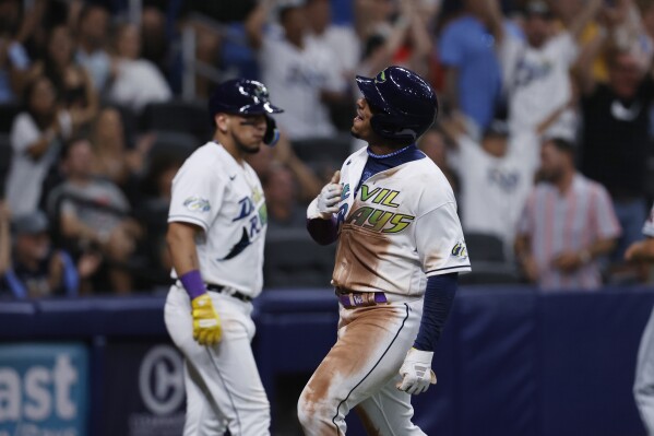 Tampa Bay Rays' Wander Franco celebrates after scoring against the Cleveland Guardians during the seventh inning of a baseball game Friday, Aug. 11, 2023, in St. Petersburg, Fla. (AP Photo/Scott Audette)