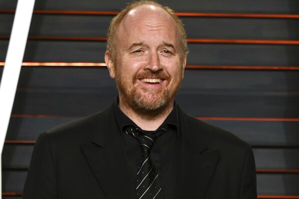 FILE - Louis C.K. appears at the Vanity Fair Oscar Party in Beverly Hills, Calif., on Feb. 28, 2016. A new documentary, "Sorry/Not Sorry," premiering at the Toronto International Film Festival delves into the allegations made against comedian Louis CK and the fallout for the women who came forward. (Photo by Evan Agostini/Invision/AP, File)