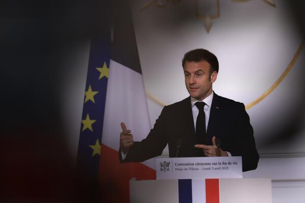 French President Emmanuel Macron delivers his speech on the end-of-life options after a panel of citizens worked the issue in recent months, Monday, April 3, 2023 at the Elysee Palace in Paris. (AP Photo/Aurelien Morissard, Pool)