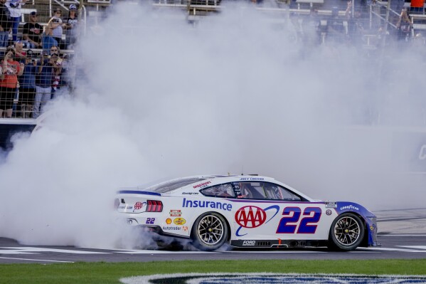 Joey Logano celebrates after winning a NASCAR Cup Series auto race at Texas Motor Speedway in Fort Worth, Texas, Sunday, May 4, 2025. (AP Photo/Larry Papke)