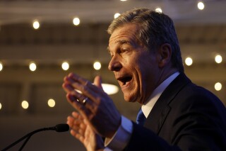 Democratic North Carolina Gov. Roy Cooper speaks at a primary election night party in Raleigh, N.C., Tuesday, March 5, 2024. (AP Photo/Karl B DeBlaker)